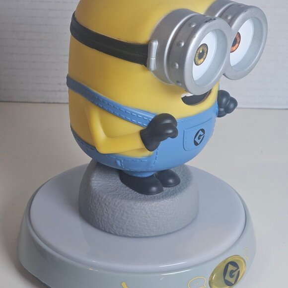 Universal Studios Minion Interactive Toy with Light-Up Base - Picture 2 of 5